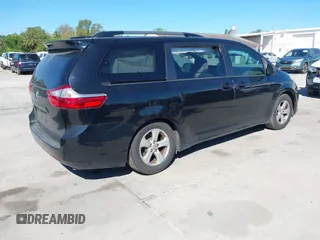 2016 Toyota Sienna LE AAS with VIN 5TDKK3DC1GS697730, listed as a IAAI auction lot 41727769 with 135,469 mi miles. Bid and sale history available at carsss.com. Image 4.