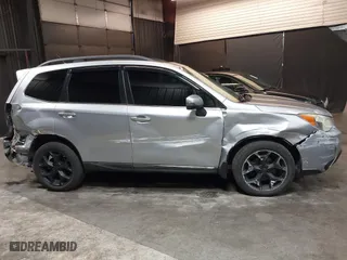 2015 Subaru Forester 2.5i Touring with VIN JF2SJAUC8FH468456, listed as a IAAI auction lot 41132284 with 188,408 mi miles. Bid and sale history available at carsss.com. Image 6.