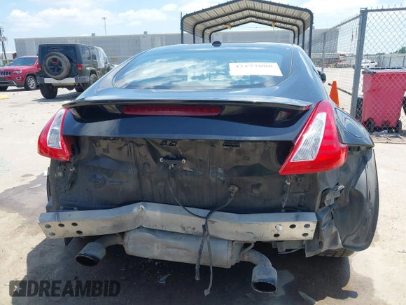 2012 Nissan 370Z z VIN JN1AZ4EH1CM564630, wystawiony jako IAAI lot #42177880 z przebiegiem 173 751 mil mil oraz . Historia ofert i sprzedaży dostępna na DreamBid. Obrazek 17.