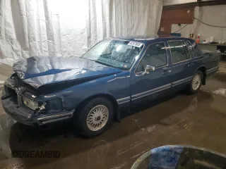 1993 Lincoln Town Car Executive with VIN 1LNLM81W9PY761085, listed as a Copart auction lot 46287805 with 119,201 mi miles and Salvage title. Bid and sale history available at DreamBid. Image 1.