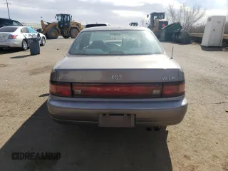 1994 Toyota Camry LE z VIN JT2GK12E2R0050878, wystawiony jako Copart lot #46878005 z przebiegiem 152 211 mil mil oraz Szkoda całkowita • Salvage title. Historia ofert i sprzedaży dostępna na DreamBid. Obrazek 6.