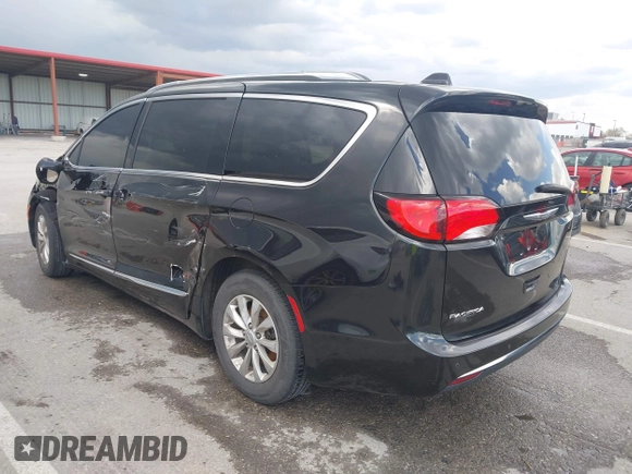 2018 Chrysler Pacifica Touring L with VIN 2C4RC1BG9JR120790, listed as a IAAI auction lot 41998460 with 124,146 mi miles and . Bid and sale history available at DreamBid. Image 3.