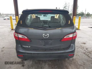 2014 Mazda 5 Touring with VIN JM1CW2CL7E0167945, listed as a IAAI auction lot 41624435 with 167,736 mi miles. Bid and sale history available at carsss.com. Image 16.