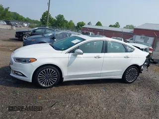 2018 Ford Fusion Titanium with VIN 3FA6P0D97JR247621, listed as a IAAI auction lot 42465608 with 174,983 mi miles and . Bid and sale history available at DreamBid. Image 15.