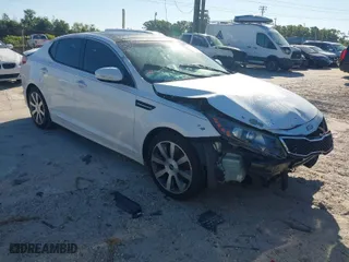2012 Kia Optima SX with VIN 5XXGR4A6XCG017695, listed as a IAAI auction lot 41837506 with 210,845 mi miles. Bid and sale history available at carsss.com. Image 1.