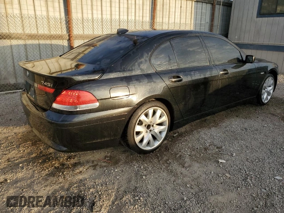 2003 BMW 7 Series 745i with VIN WBAGL63483DP65989, listed as a Copart auction lot 82057064 with 60,735 mi miles and Salvage title. Bid and sale history available at DreamBid. Image 3.