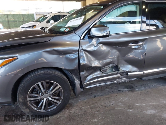 2019 Infiniti QX60 Luxe with VIN 5N1DL0MM8KC558679, listed as a IAAI auction lot 41973649 with 51,867 mi miles and . Bid and sale history available at DreamBid. Image 6.