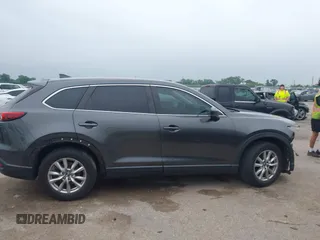 2017 Mazda CX-9 Sport z VIN JM3TCBBY6H0136591, wystawiony jako IAAI lot #42289860 z przebiegiem 118 067 mil mil oraz . Historia ofert i sprzedaży dostępna na DreamBid. Obrazek 13.