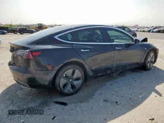 2019 Tesla Model 3 Mid Range with VIN 5YJ3E1EA9KF193033, listed as a Copart auction lot 51225195 with 72,722 mi miles and Salvage Title. Bid and sale history available at DreamBid. Image 3.