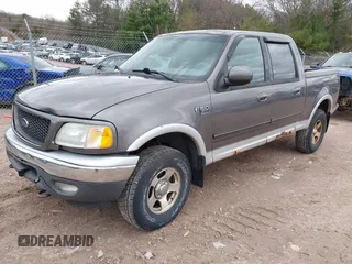 2002 Ford F-150 XLT with VIN 1FTRW08612KB42637, listed as a IAAI auction lot 42036615 with 178,548 mi miles. Bid and sale history available at carsss.com. Image 2.