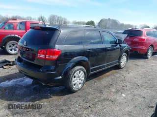 2017 Dodge Journey SE z VIN 3C4PDCAB2HT698940, wystawiony jako IAAI lot #41843176 z przebiegiem 141 499 mil mil oraz . Historia ofert i sprzedaży dostępna na DreamBid. Obrazek 4.