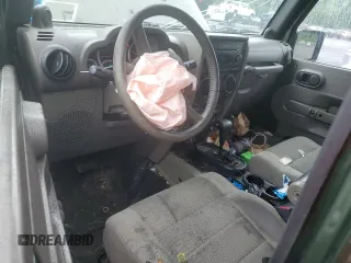 2007 Jeep Wrangler Unlimited Sahara с VIN 1J4GA59107L141710, выставлен на аукционе Copart как лот 59939755 с пробегом 212 659 миль миль и Списание • Salvage title. История ставок и продаж доступна на DreamBid. Изображение 8.