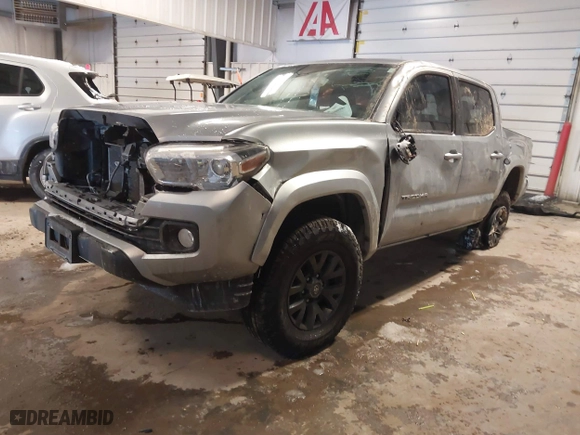 2022 Toyota Tacoma 4WD SR with VIN 3TMCZ5ANXNM490882, listed as a IAAI auction lot 41590988 with 67,669 mi miles. Bid and sale history available at carsss.com. Image 18.