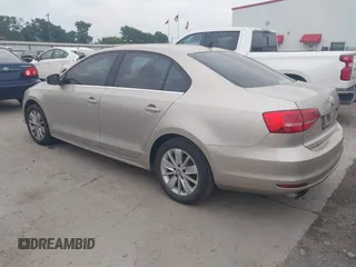 2015 Volkswagen Jetta Sedan 1.8T SE w/Connectivity with VIN 3VWD07AJ0FM231873, listed as a IAAI auction lot 42142327 with 156,230 mi miles. Bid and sale history available at carsss.com. Image 3.