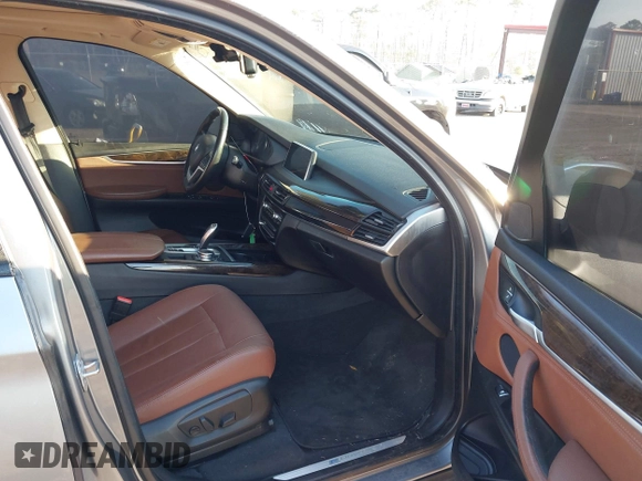 2016 BMW X5 xDrive40e with VIN 5UXKT0C57G0S75476, listed as a IAAI auction lot 41642249 with 105,489 mi miles and . Bid and sale history available at DreamBid. Image 5.
