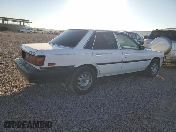 1989 Toyota Camry z VIN 4T1SV24E5KU019985, wystawiony jako Copart lot #81200104 z przebiegiem 207 103 mil mil oraz Szkoda całkowita • Salvage title. Historia ofert i sprzedaży dostępna na DreamBid. Obrazek 3.