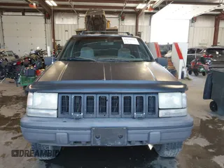 1995 Jeep Grand Cherokee Laredo z VIN 1J4GZ58Y3SC670696, wystawiony jako IAAI lot #42530934 z przebiegiem 165 658 mil mil oraz . Historia ofert i sprzedaży dostępna na DreamBid. Obrazek 12.