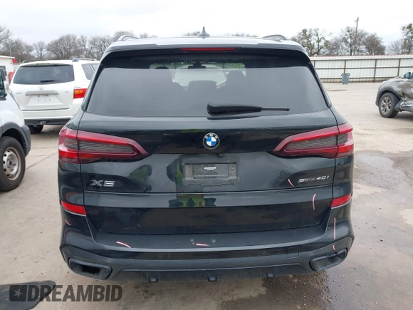 2022 BMW X5 sDrive40i with VIN 5UXCR4C07N9M28669, listed as a IAAI auction lot 41543581 with 59,497 mi miles. Bid and sale history available at carsss.com. Image 17.