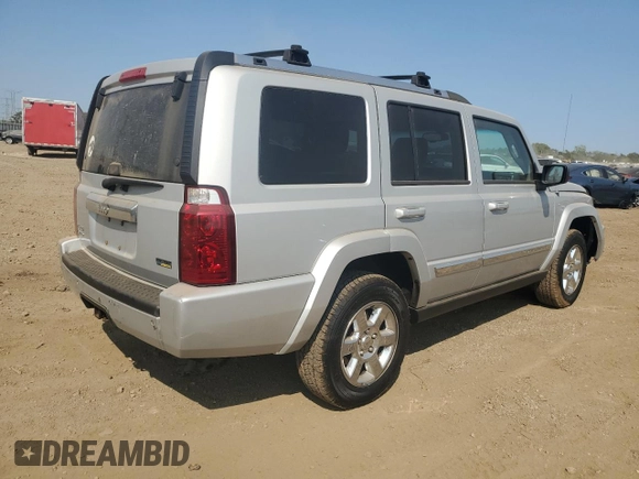 2007 Jeep Commander Limited with VIN 1J8HG58P87C595890, listed as a Copart auction lot 71123654 with 148,438 mi miles and Salvage Title. Bid and sale history available at carsss.com. Image 3.