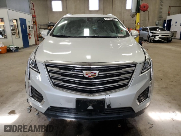 2017 Cadillac XT5 Luxury AWD z VIN 1GYKNDRS8HZ232420, wystawiony jako Copart lot #88865285 z przebiegiem 136 104 mil mil oraz Szkoda całkowita • Salvage title. Historia ofert i sprzedaży dostępna na DreamBid. Obrazek 5.