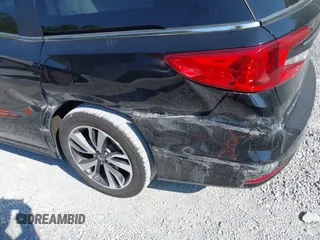 2021 Honda Odyssey Touring with VIN 5FNRL6H84MB027396, listed as a IAAI auction lot 42616650 with 67,207 mi miles and . Bid and sale history available at DreamBid. Image 18.
