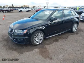 2016 Audi A3 e-tron Premium with VIN WAUUPBFF6GA138034, listed as a IAAI auction lot 41524489 with 90,453 mi miles. Bid and sale history available at carsss.com. Image 2.