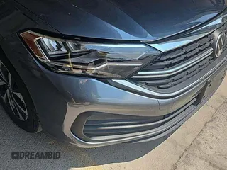 2024 Volkswagen Jetta S with VIN 3VW5M7BU2RM043054, listed as a IAAI auction lot 42852875 with 27,670 mi miles and . Bid and sale history available at DreamBid. Image 4.