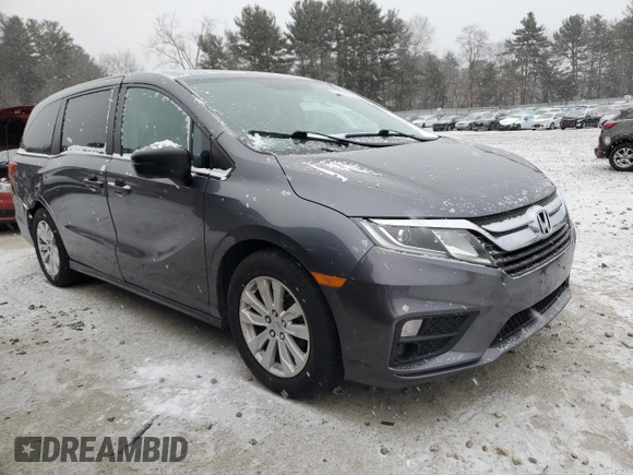 2018 Honda Odyssey LX with VIN 5FNRL6H28JB013928, listed as a Copart auction lot 87695025 with 194,390 mi miles and Salvage Title. Bid and sale history available at carsss.com. Image 4.