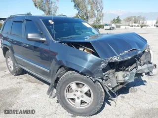 2007 Jeep Grand Cherokee Laredo with VIN 1J8HR48PX7C660601, listed as a IAAI auction lot 41652509 with 131,556 mi miles. Bid and sale history available at carsss.com. Image 1.