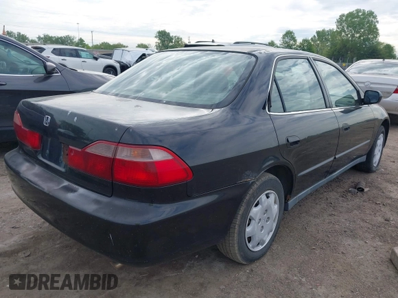 1999 Honda Accord LX z VIN JHMCG564XXC007996, wystawiony jako IAAI lot #42228809 z przebiegiem 342 104 mil mil oraz . Historia ofert i sprzedaży dostępna na DreamBid. Obrazek 4.