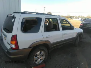 2003 Mazda Tribute LX with VIN 4F2YZ04153KM18168, listed as a IAAI auction lot 39240269 with 225,859 mi miles and . Bid and sale history available at DreamBid. Image 4.
