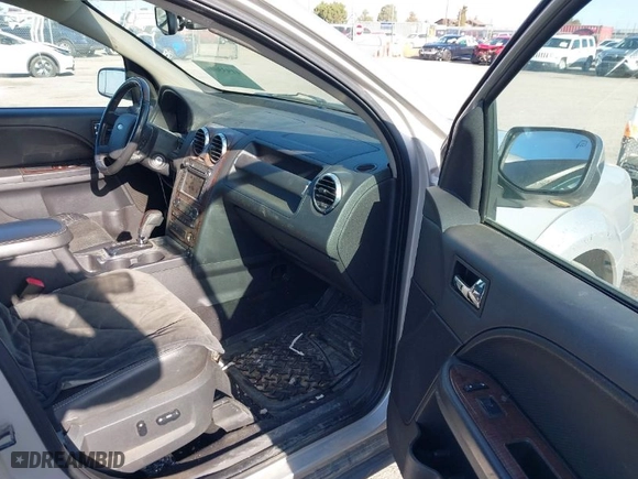 2008 Ford Taurus X Limited with VIN 1FMDK06W08GA44960, listed as a IAAI auction lot 41933001 with 283,959 mi miles. Bid and sale history available at carsss.com. Image 5.