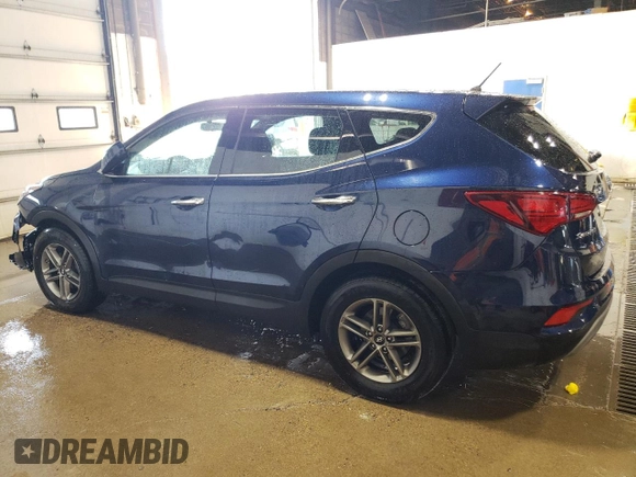 2018 Hyundai Santa Fe 2.4L z VIN 5XYZTDLB4JG553894, wystawiony jako Copart lot #56859585 z przebiegiem 97 313 mil mil oraz Szkoda całkowita • Salvage title. Historia ofert i sprzedaży dostępna na DreamBid. Obrazek 2.