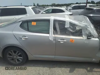 2013 Kia Optima LX z VIN 5XXGM4A73DG094160, wystawiony jako IAAI lot #41523337 z przebiegiem Nie podano mil oraz . Historia ofert i sprzedaży dostępna na DreamBid. Obrazek 12.