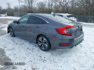 2017 Honda Civic EX-T with VIN 19XFC1E38HE031851, listed as a IAAI auction lot 41625294 with 97,432 mi miles and . Bid and sale history available at DreamBid. Image 3.