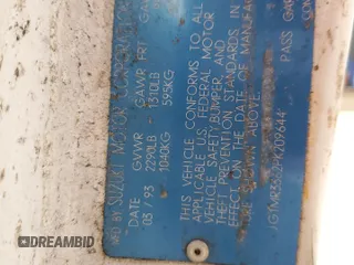 1993 Geo Metro z VIN JG1MR3362PK209644, wystawiony jako Copart lot #58749655 z przebiegiem 149 163 mil mil oraz Szkoda całkowita • Salvage title. Historia ofert i sprzedaży dostępna na DreamBid. Obrazek 13.