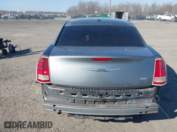 2012 Chrysler 300 with VIN 2C3CCAAG1CH138303, listed as a IAAI auction lot 41773979 with 252,550 mi miles and . Bid and sale history available at DreamBid. Image 16.