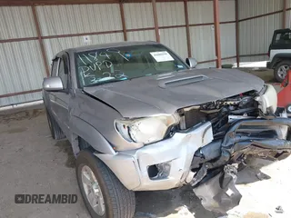 2015 Toyota Tacoma PreRunner with VIN 5TFJU4GN4FX082557, listed as a IAAI auction lot 41880190 with 234,099 mi miles and . Bid and sale history available at DreamBid. Image 1.
