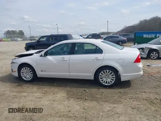 2010 Ford Fusion Hybrid with VIN 3FADP0L33AR392806, listed as a IAAI auction lot 41811194 with 131,627 mi miles. Bid and sale history available at carsss.com. Image 14.