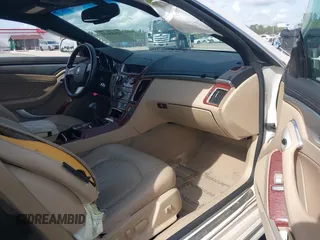 2014 Cadillac CTS Performance with VIN 1G6DC1E39E0132332, listed as a IAAI auction lot 42485811 with 109,899 mi miles and . Bid and sale history available at DreamBid. Image 5.