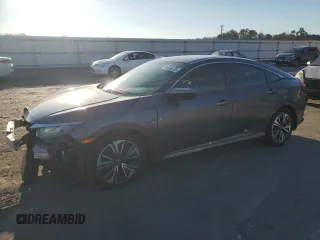 2016 Honda Civic EX-L with VIN 19XFC1F74GE032057, listed as a Copart auction lot 61214535 with 75,125 mi miles and Salvage title. Bid and sale history available at DreamBid. Image 1.