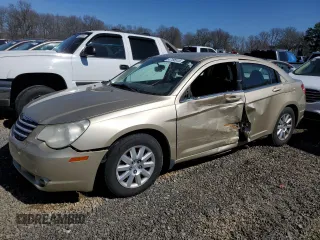 2010 Chrysler Sebring Touring z VIN 1C3CC4FBXAN119459, wystawiony jako Copart lot #47165515 z przebiegiem 125 382 mil mil oraz Szkody całkowita. Historia ofert i sprzedaży dostępna na DreamBid. Obrazek 1.