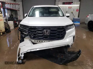 2023 Honda Pilot EX-L z VIN 5FNYG1H56PB043273, wystawiony jako Copart lot #88769535 z przebiegiem 19 033 mil mil oraz Szkoda całkowita • Salvage title. Historia ofert i sprzedaży dostępna na DreamBid. Obrazek 5.