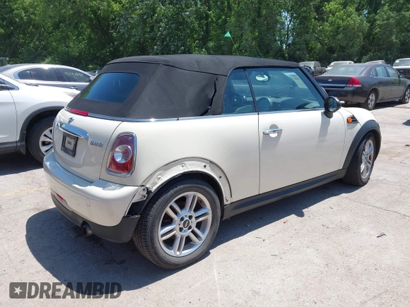 2012 MINI Convertible with VIN WMWZN3C51CT134646, listed as a IAAI auction lot 42252740 with 124,278 mi miles and . Bid and sale history available at DreamBid. Image 4.