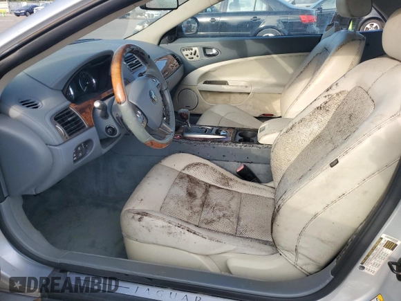 2007 Jaguar XK with VIN SAJDA44B075B01008, listed as a Copart auction lot 69111284 with 0 mi miles and Salvage Title. Bid and sale history available at carsss.com. Image 7.