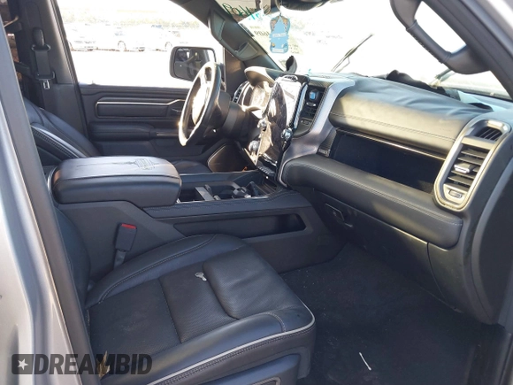 2021 Ram 1500 Limited with VIN 1C6SRFHT1MN510020, listed as a IAAI auction lot 40634609 with Not provided miles and . Bid and sale history available at DreamBid. Image 5.
