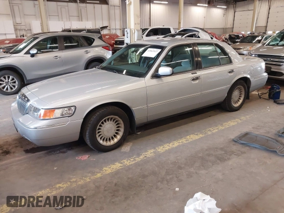 2000 Mercury Grand Marquis LS z VIN 2MEFM75W0YX736324, wystawiony jako IAAI lot #41865927 z przebiegiem 136 886 mil mil oraz . Historia ofert i sprzedaży dostępna na DreamBid. Obrazek 17.