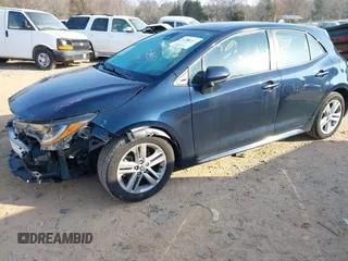 2021 Toyota Corolla Hatchback SE with VIN JTND4MBE9M3114388, listed as a IAAI auction lot 41796303 with 58,656 mi miles. Bid and sale history available at carsss.com. Image 2.