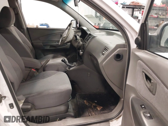 2006 Hyundai Tucson GL with VIN KM8JM72BX6U465737, listed as a IAAI auction lot 42203453 with 162,107 mi miles. Bid and sale history available at carsss.com. Image 5.