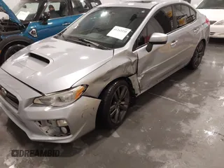 2016 Subaru WRX Premium with VIN JF1VA1E64G8811369, listed as a IAAI auction lot 41243335 with 129,319 mi miles. Bid and sale history available at carsss.com. Image 6.